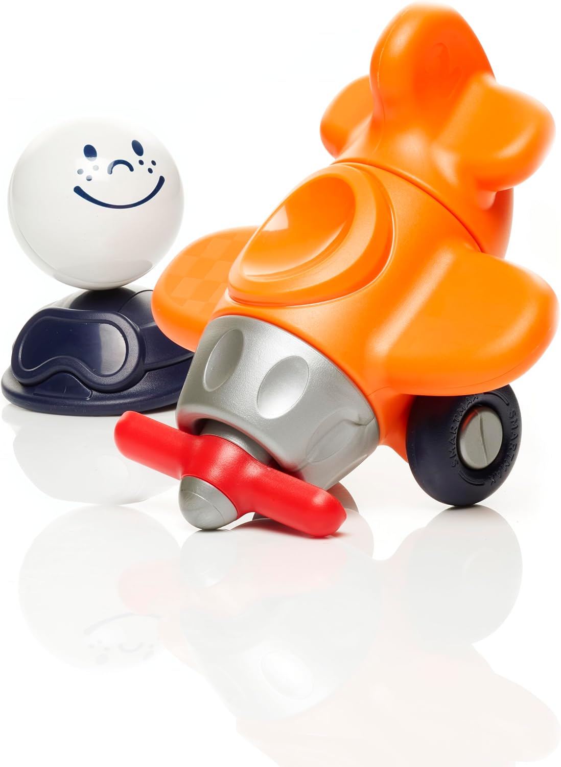 SmartMax My First Plane magnetic toy featuring an assembled orange and silver airplane with a red propeller, black wheels, and a white pilot ball figure with a smiling face on a white background.