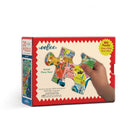 Puzzle box with colorful puzzle pieces and a hand holding one piece, on a white background