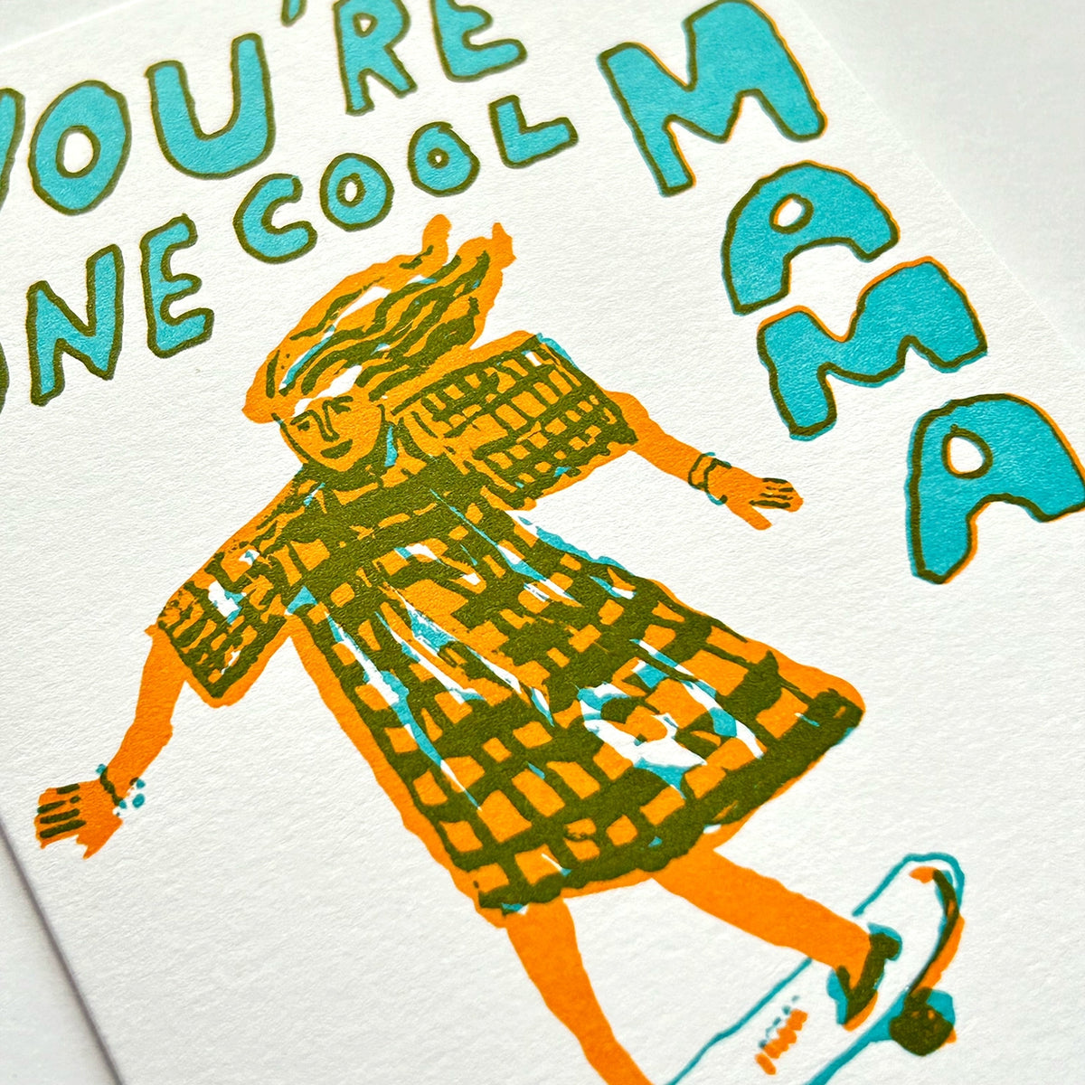 Illustration of a child in a dress with text 'You're one cool mama' on a white background