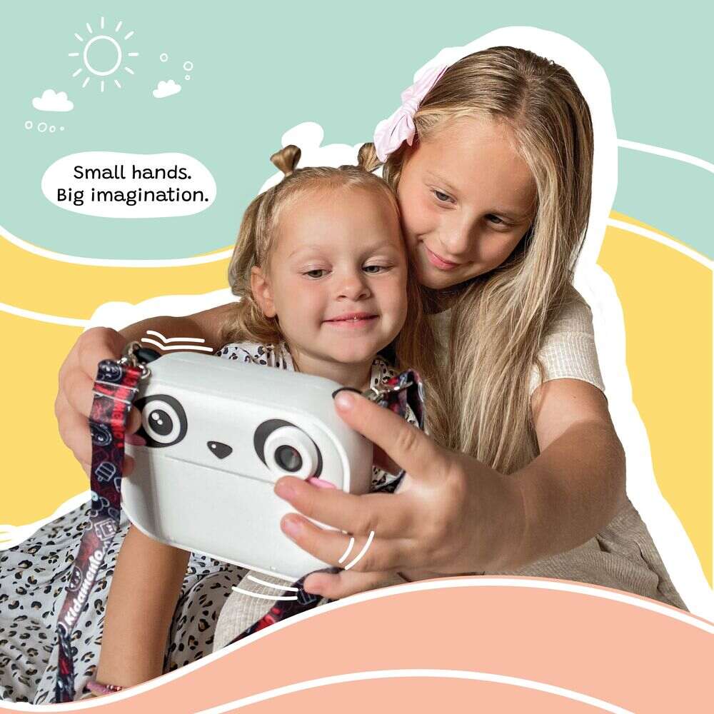 Two children holding a toy device with a colorful background and text 'Small hands. Big imagination.'