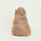 Plush toy resembling a dog from behind on a white background