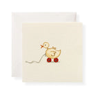 Card with a cartoon duck on wheels design on a beige background