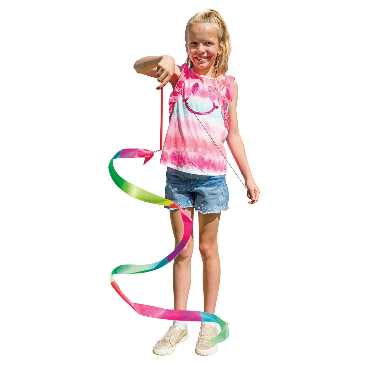 Young girl holding a colorful ribbon toy against a white background