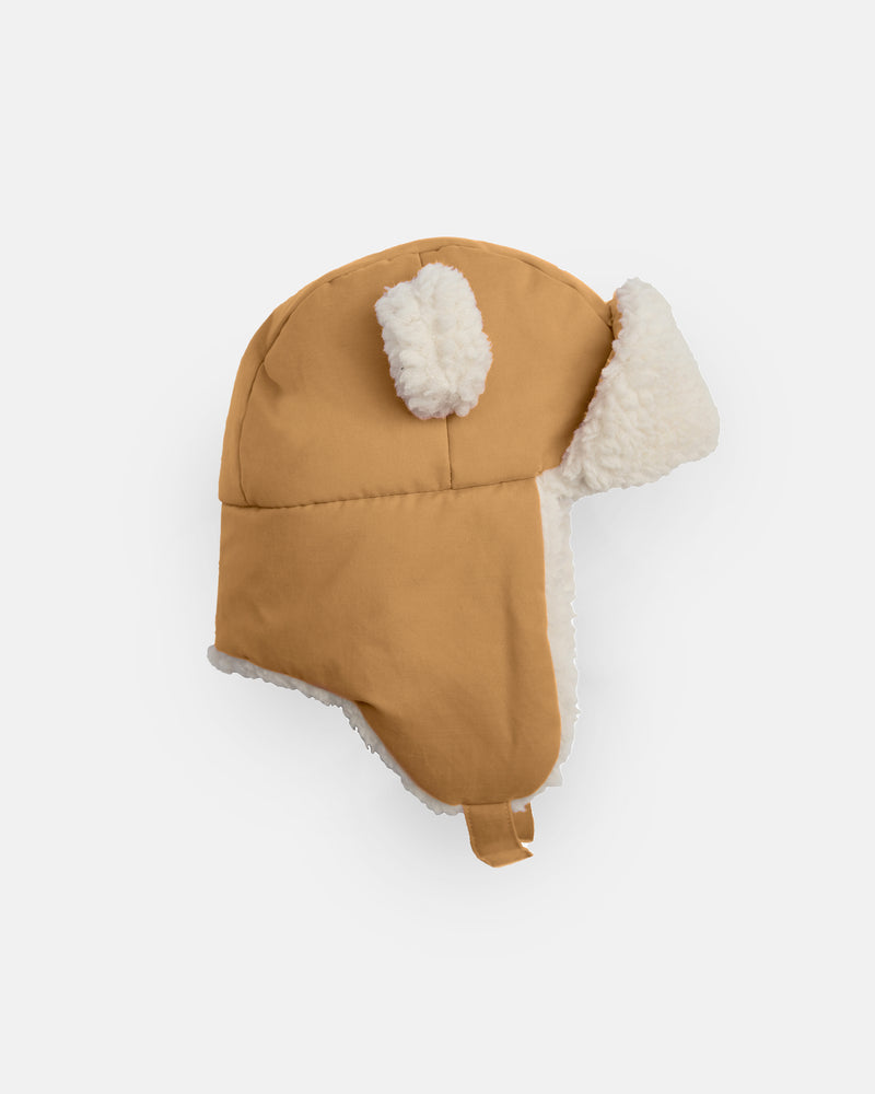 A brown and white sherpa-lined baby hat with bear ears, featuring an adjustable snap neck closure.