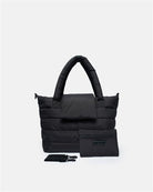 Black puffer bag with a strap on a white background
