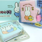 Miffy-themed products including a lockable notebook and keychain on a white background.