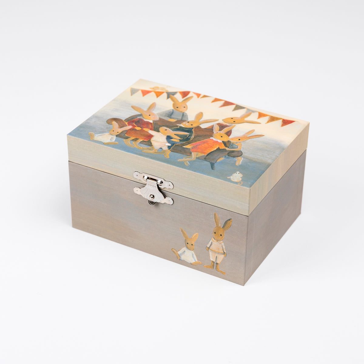 A rectangular wooden storage box with a hinged lid, featuring a painted illustration of rabbits on a blue background on the lid and two rabbits on the front panel. The box has a light beige lower section and a pale wood-toned upper section, with a silver metal clasp closure.