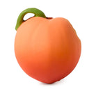 Peach-shaped toy with a green stem on a white background
