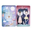 Open view of the "Enchanted Magnetic Playtime" tin by Floss & Rock, showing magnetic characters—including two princesses and various animals—placed against the inside play scenes.