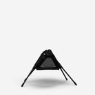 Black triangular baby carrier on a white background