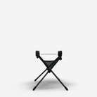 Black folding chair on a white background