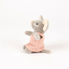 A small plush mouse toy in gray with beige ears, wearing a pink dress, photographed on a clean white background.