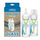 Two Dr. Brown's Anti-colic options+ baby bottles with clear caps and white nipples, shown next to their retail packaging box on a white background.