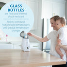 Woman holding a baby and using a bottle warmer with text about glass bottles' properties.
