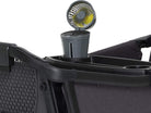 Black outdoor chair with cup holder and fan on a white background