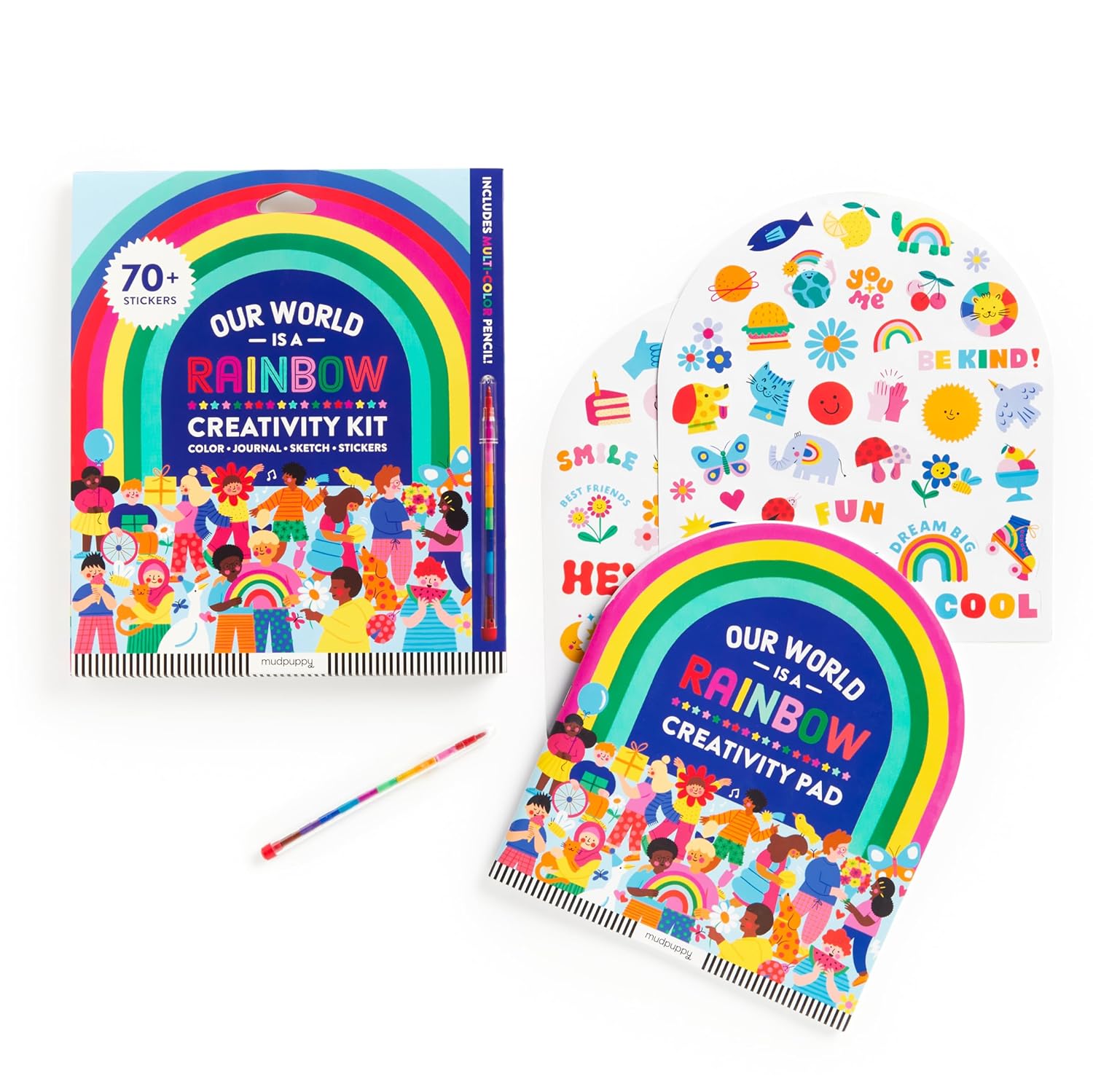 Rainbow-themed creativity kit with stickers and pad on a white background