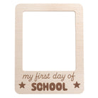 Wooden frame with 'my first day of school' text on a white background