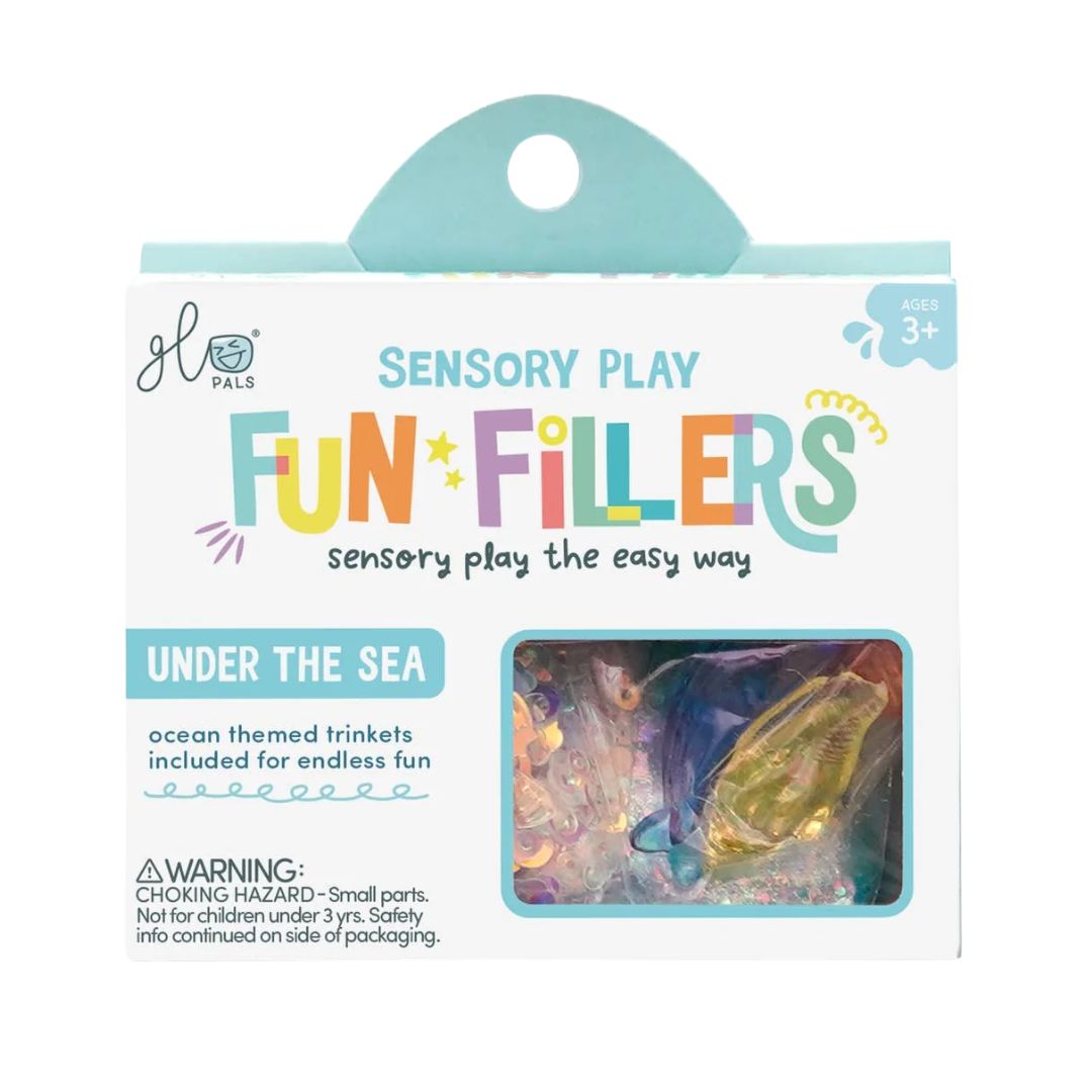 Glo Pals Sensory Play Fun Fillers 'Under the Sea' toy set in its original retail packaging, featuring ocean-themed trinkets visible through a clear window on a white and teal box.