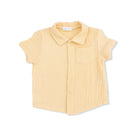 Yellow short-sleeve shirt on a white background
