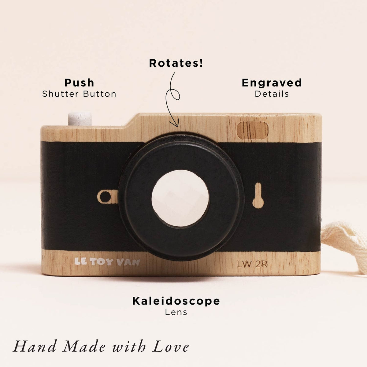 Wooden kaleidoscope with engraved details and push shutter button, brand 'Le Toy Van' visible.