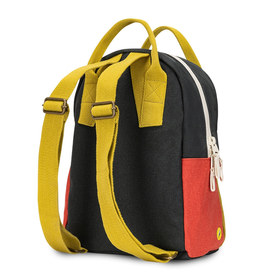 Black and red backpack with yellow straps on a white background