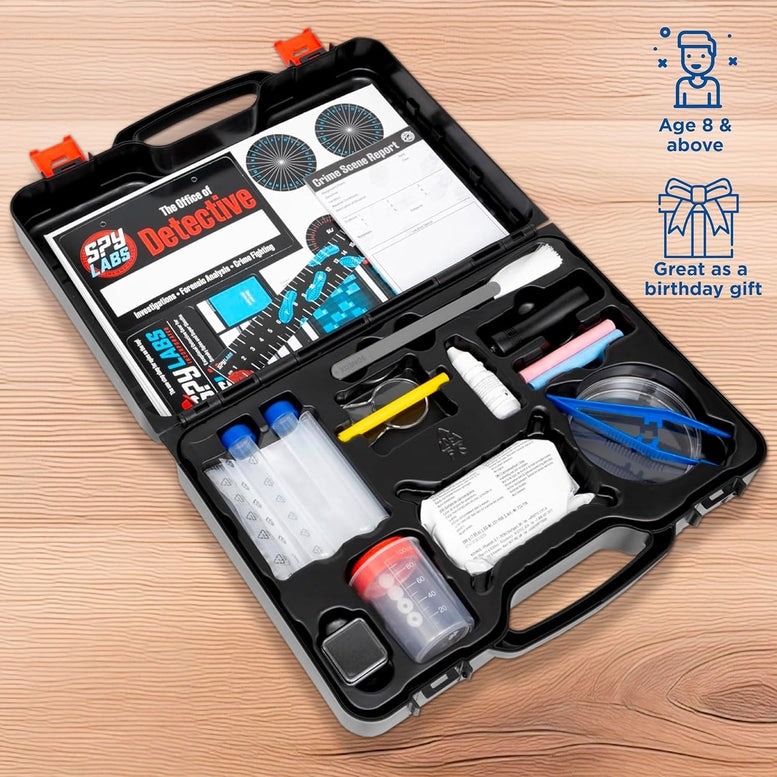 Open detective kit with tools and accessories on a wooden surface, featuring Spy Labs branding.