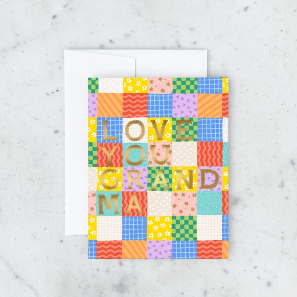 Colorful patchwork-style card with 'LOVE YOU GRANDMA' text on a marble background