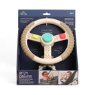 Toy steering wheel in packaging with branding and product details.