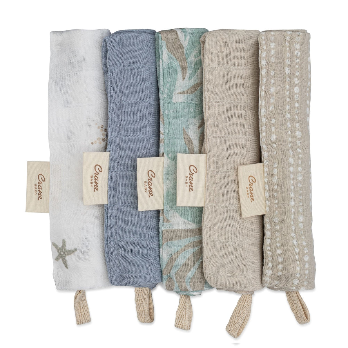 Set of five folded fabric swatches in various colors with tags, on a white background.