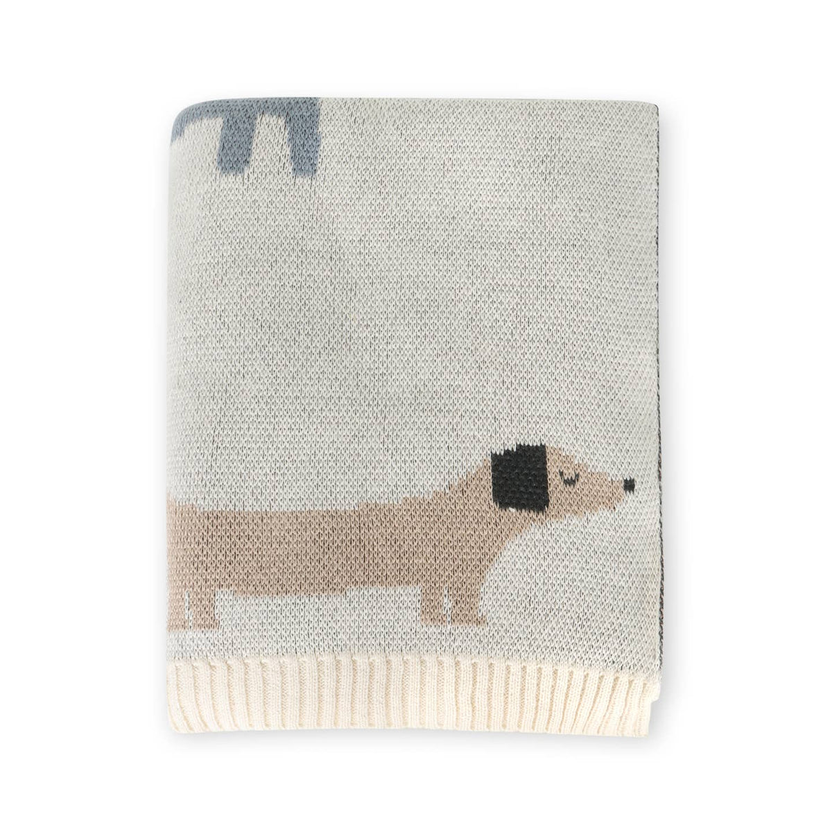 Knitted blanket with a dachshund design on a light gray background