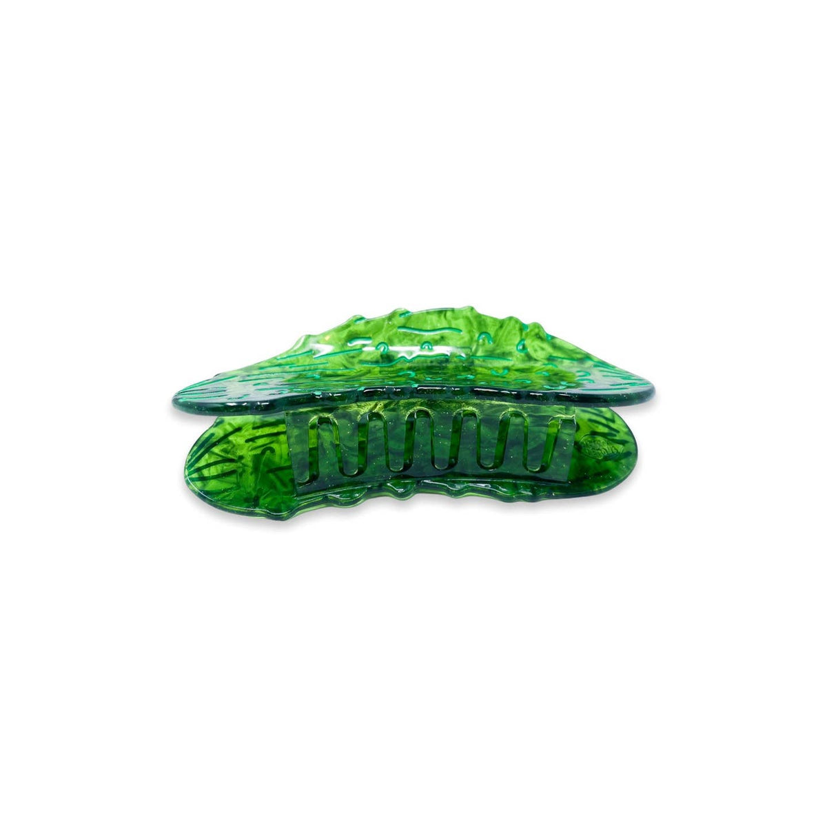Green hair clip on a white background
