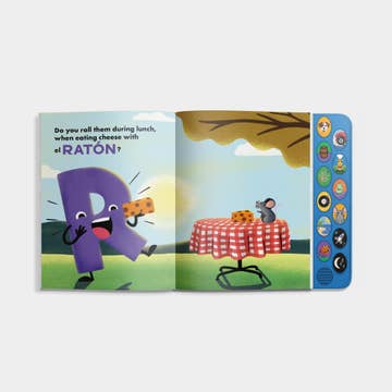Open book with cartoon character 'R' and mouse at a picnic table on a white background