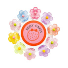 Eggy Cakes logo with colorful flower-shaped candies on a white background