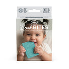A package of Fred Book Bites teething toys, featuring a baby photo on the front and a turquoise-colored teething toy visible, set against a plain white background.