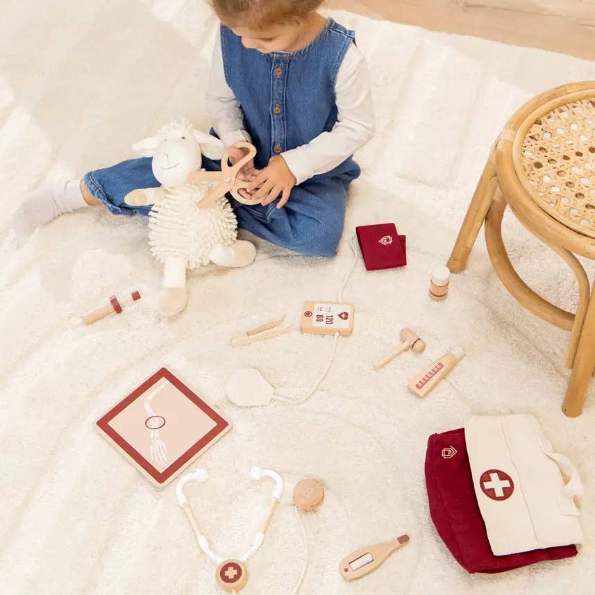 Child playing with toys on a light-colored floor