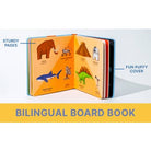 Bilingual board book with illustrations of animals and objects on open pages.