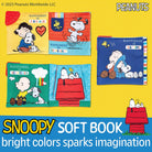 Collection of Snoopy-themed soft books on a yellow background with Peanuts branding.