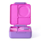 Pink and purple bento box with compartments on a white background