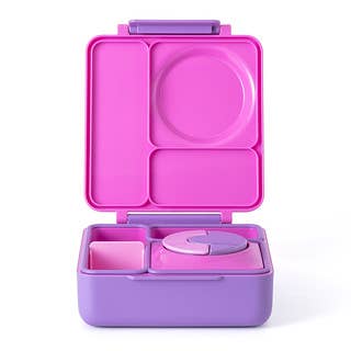 Pink and purple bento box with compartments on a white background