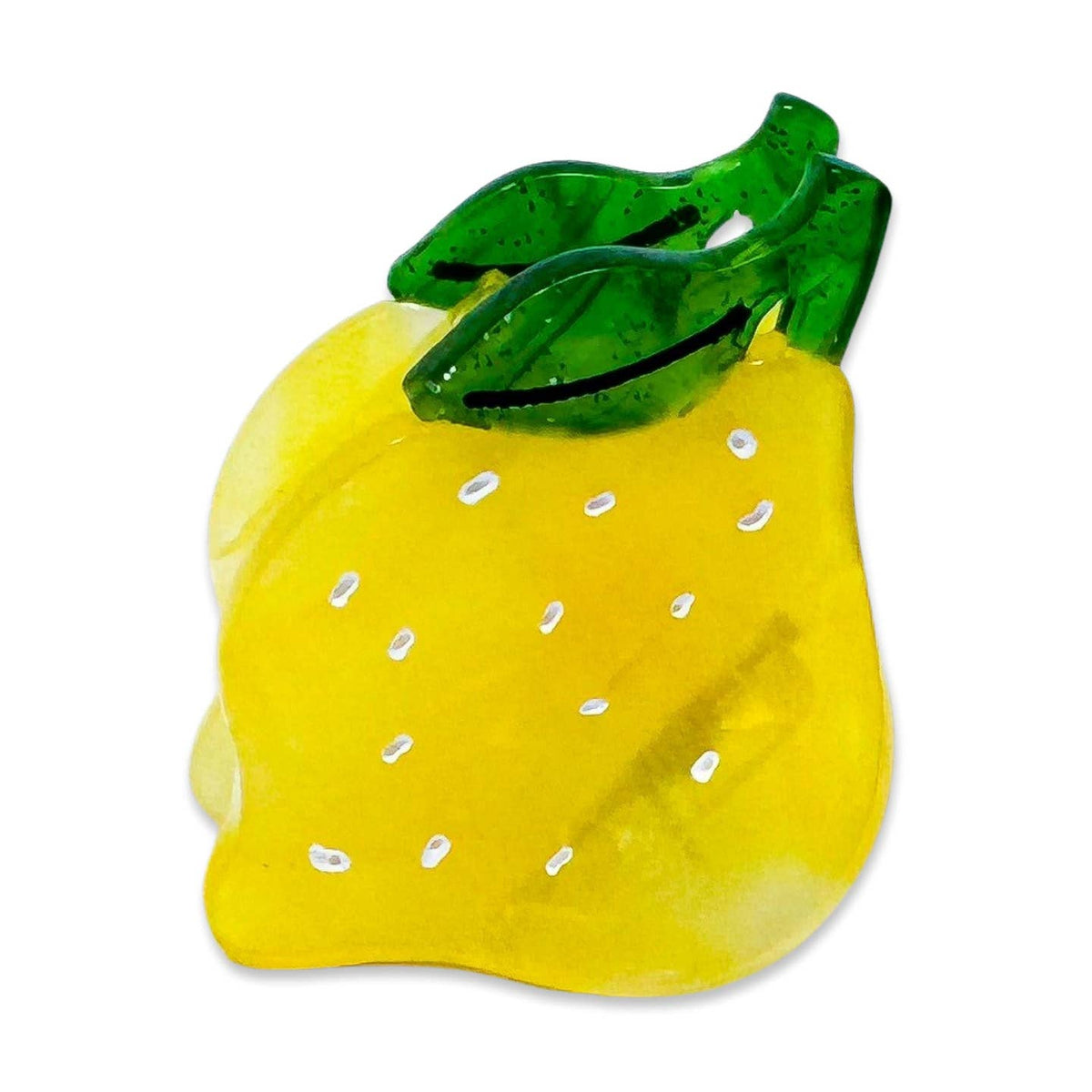 Yellow lemon-shaped object with green leaf on a white background