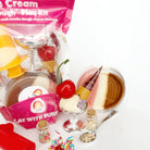Ice cream-themed play kit with toy ice cream cones and toppings on a white background