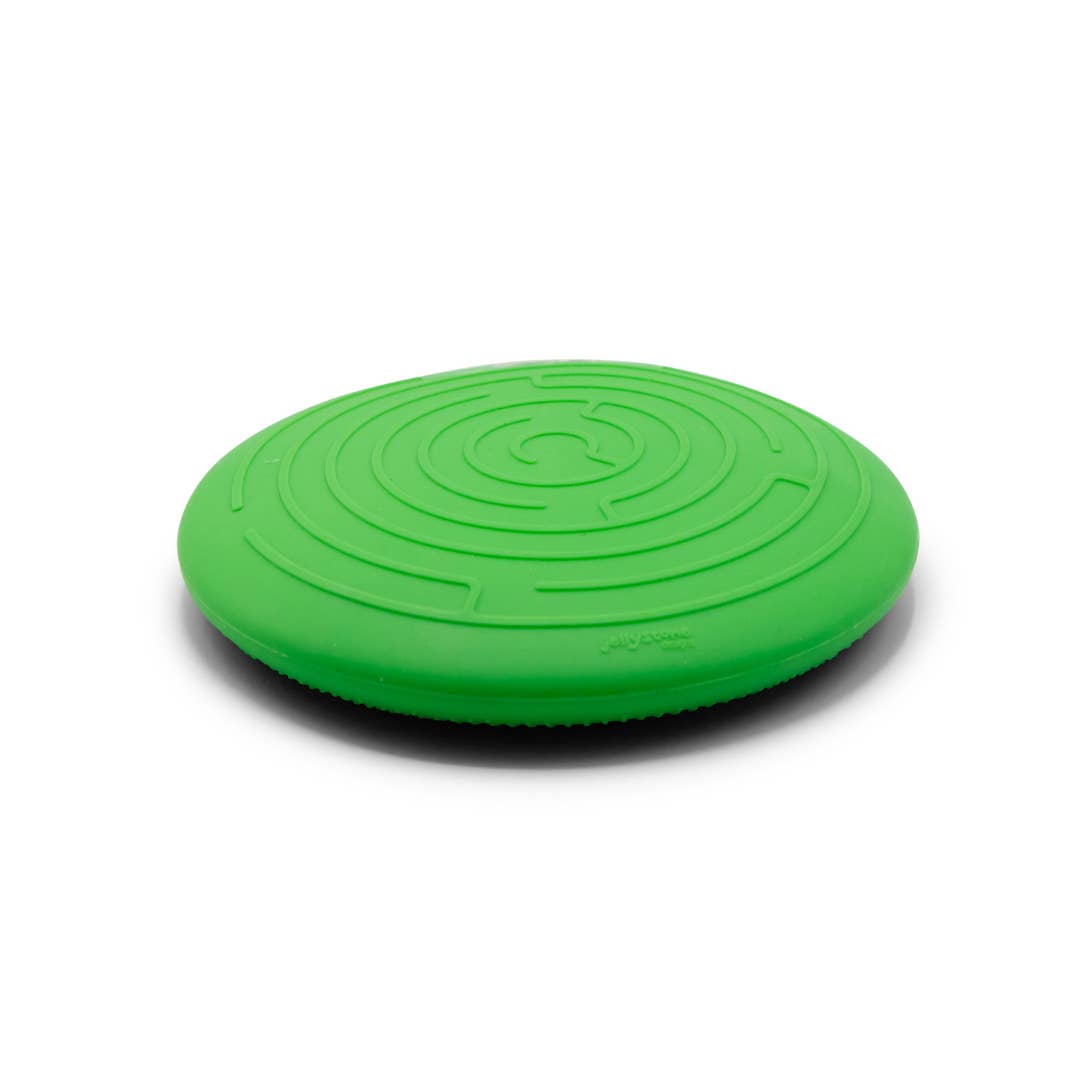 Green balance disc on a white background