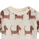 Knitted sweater with dachshund pattern on a white background