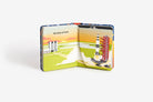 Children's book with illustrations of a rocket launch on a white background