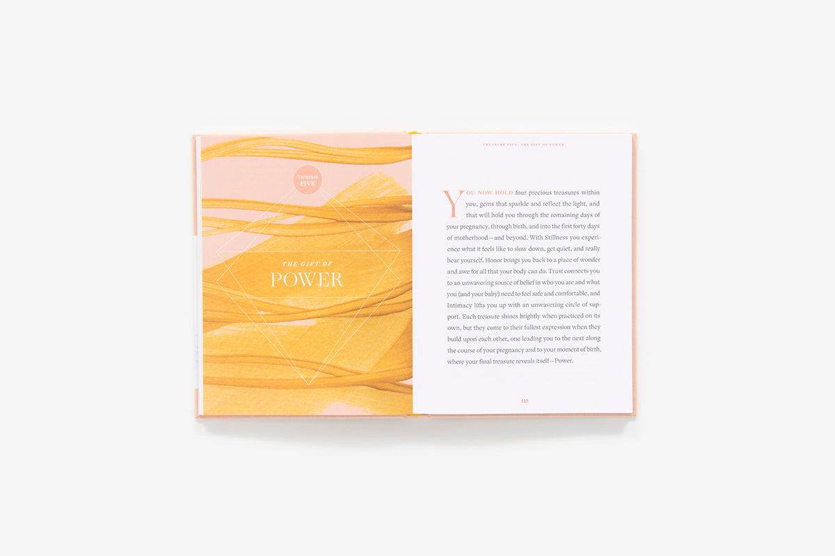Open book with yellow marbled pages and white text on a white background