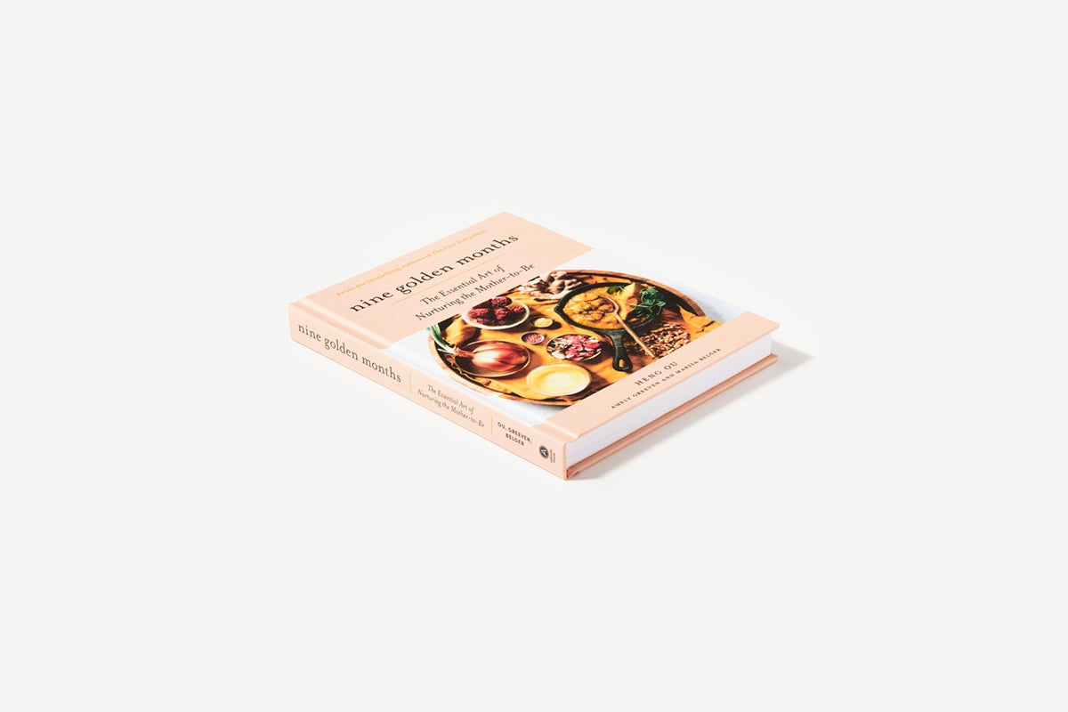 Cookbook titled 'The Golden Moment' on a white background