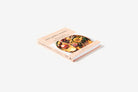 Cookbook titled 'The Golden Moment' on a white background