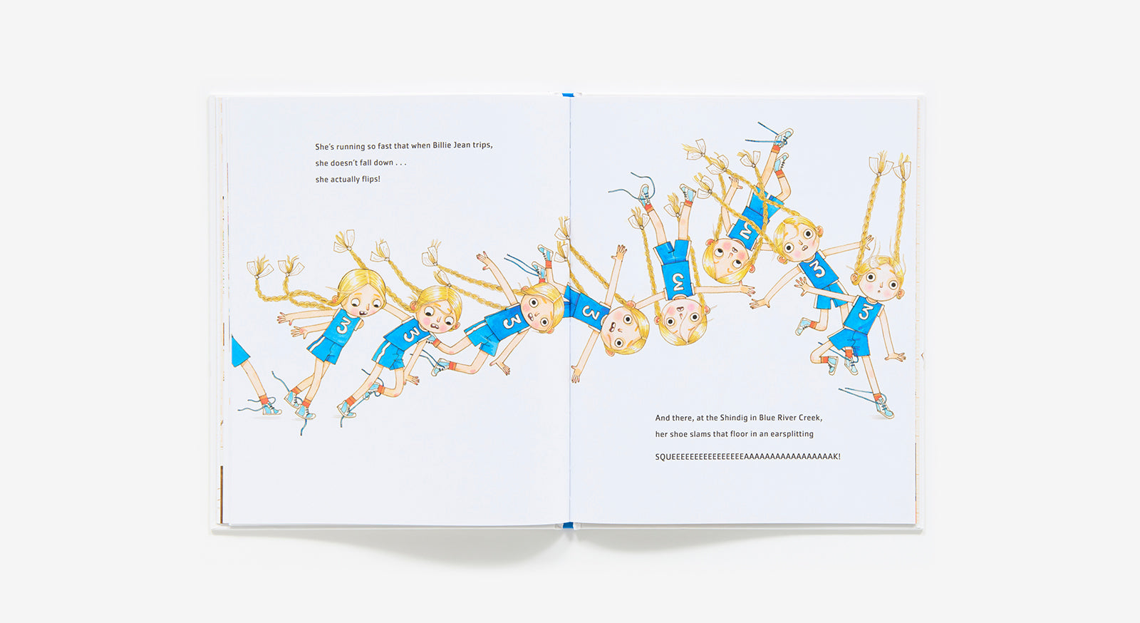 Open book showing illustrations of children in blue outfits on a white background