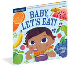 The front cover of the children's board book 'Baby, Let's Eat!' by Stephan Lomp, published by Indestructibles. The cover features a colorful illustration of a baby eating from a bowl, surrounded by various fruits like watermelon, orange, banana, pear, apple, and berries.