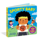 A children's hardboard activity book titled 'SPORTY BABY' by Grace Habib, featuring a colorful illustration of a boy holding a basketball with soccer and football players in the background. The book is shown standing upright at a slight angle against a clean white background.